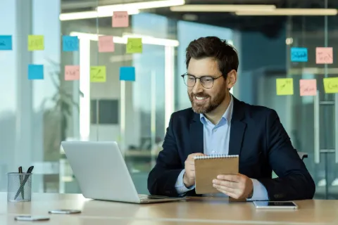 Businessman smiling in a modern office